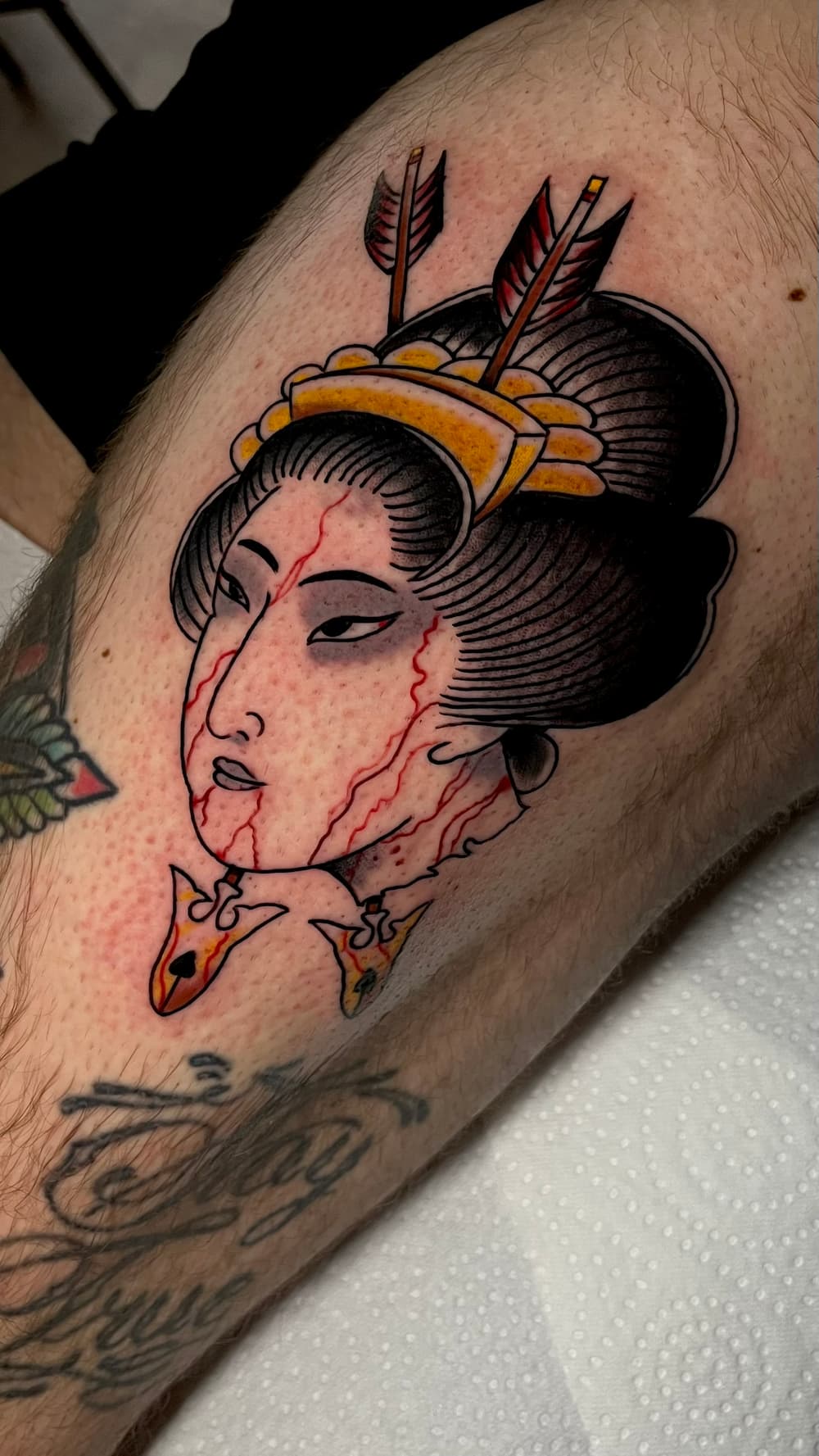 Japanese namakubi tattoo op het bovenbeen door Ernst, tattoo artiest Barendrecht
